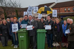 Cllr Keith Orrell (far right) and Cllr Runciman (fourth from right) campaigning against green bin cuts last year.